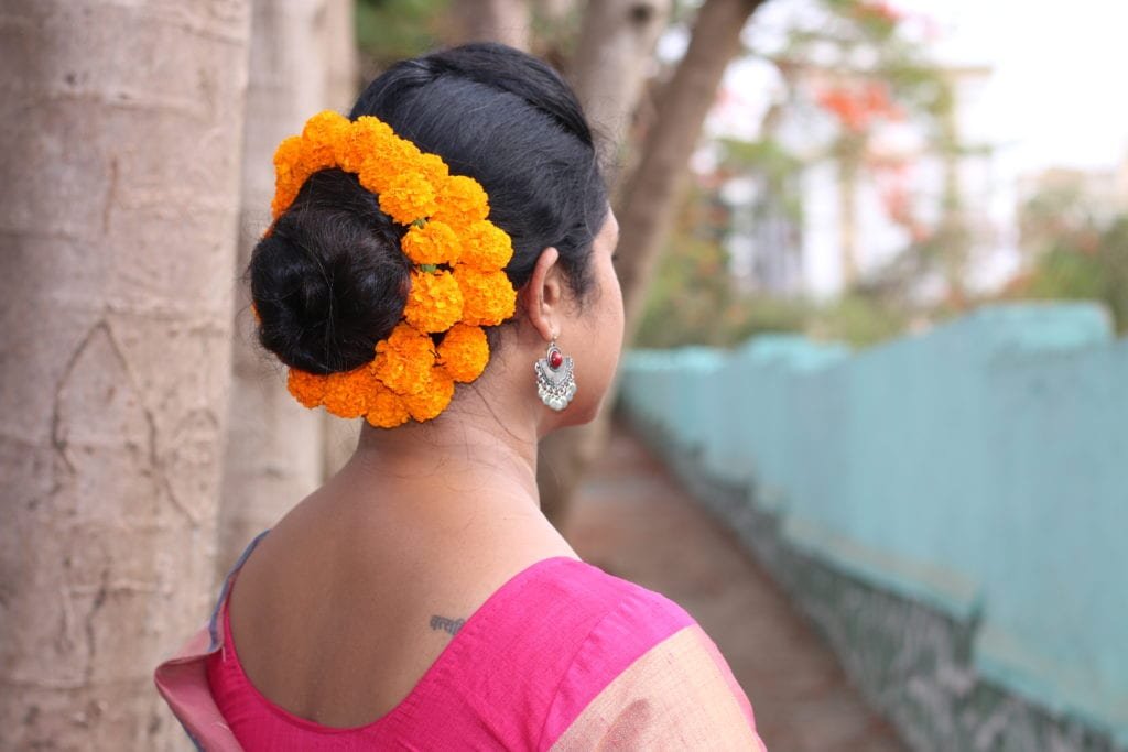 Marigold hair bun - salonguruindia.com